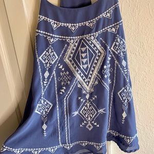 Blue flowy tank top. Barely worn.